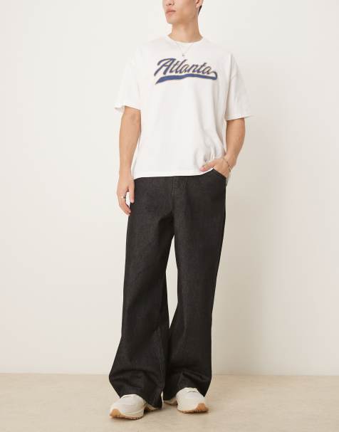 ASOS DESIGN – Superweite Jeans in schwarzer Rinse-Waschung - view 1