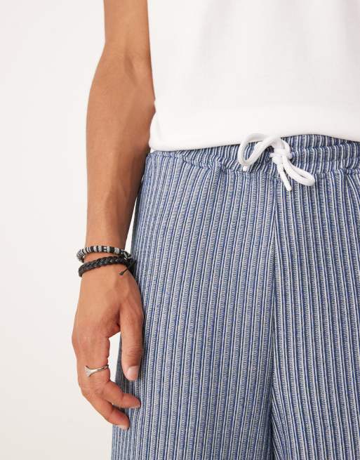 ASOS DESIGN – Superweite Jogginghose in Blau mit schmalen Streifen, 5 von 5