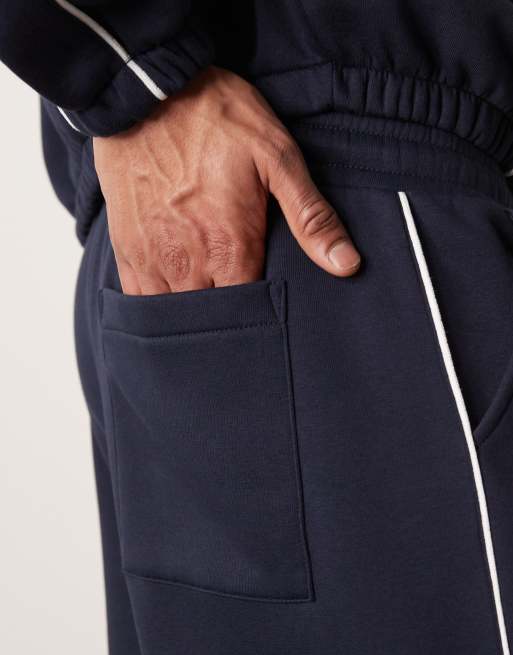 ASOS DESIGN supper baggy sweatpants with side piping in navy - part of a set