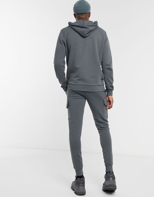 ASOS DESIGN - Survêtement ajusté composé d'un sweat à capuche et d'un  jogger cargo ajusté - Noir délavé