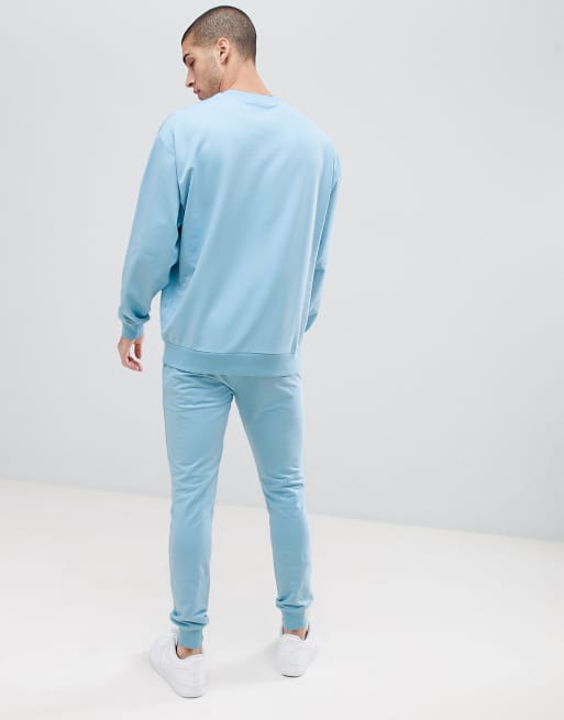 ASOS DESIGN Surv tement avec sweat shirt oversize pantalon de jogging super ajust Bleu ciel