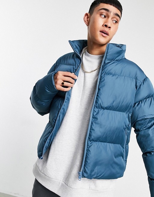 ASOS DESIGN sustainable puffer jacket in cropped length in blue | ASOS