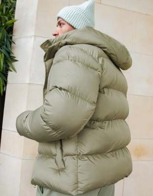 asos design sustainable puffer jacket in black with funnel neck