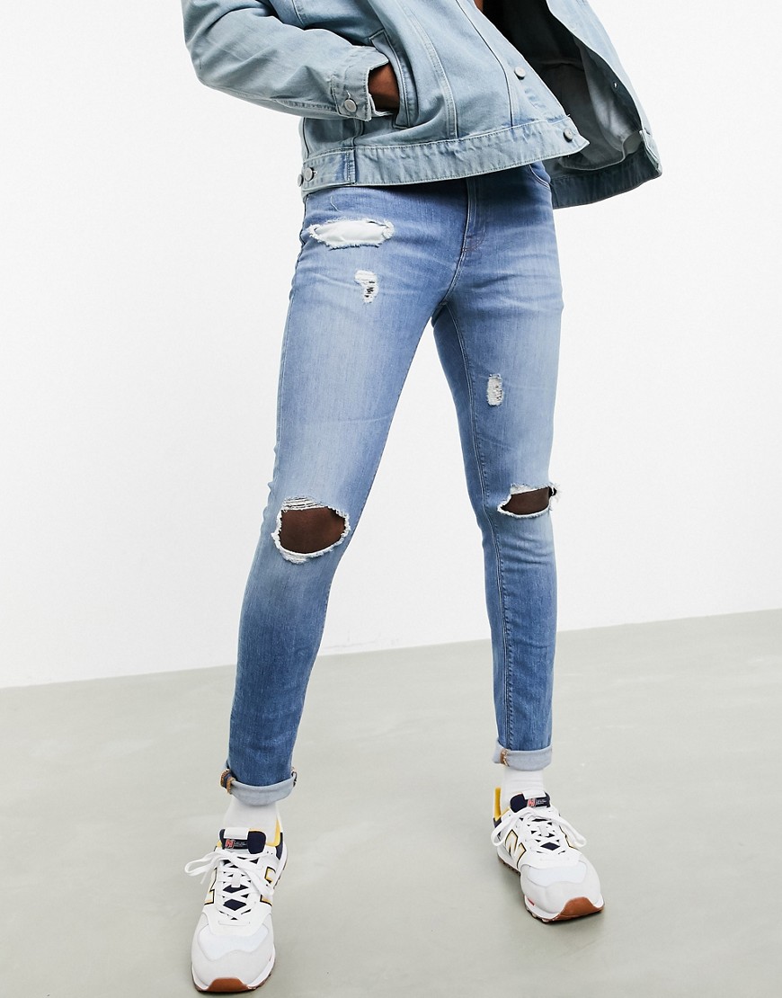 ASOS DESIGN - 'Sustainable' - superskinny jeans i mid wash med flænger på knæ-Blå