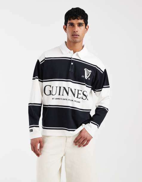 ASOS DESIGN – Svart, avslappnad pikétröja med Guinness-tryck - view 1