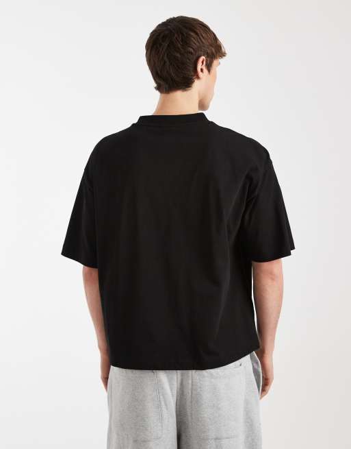 ASOS DESIGN – Svart, boxig t-shirt i oversized fit med fotbollstryck , 3 av 5