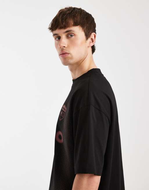 ASOS DESIGN – Svart, boxig t-shirt i oversized fit med fotbollstryck , 4 av 5