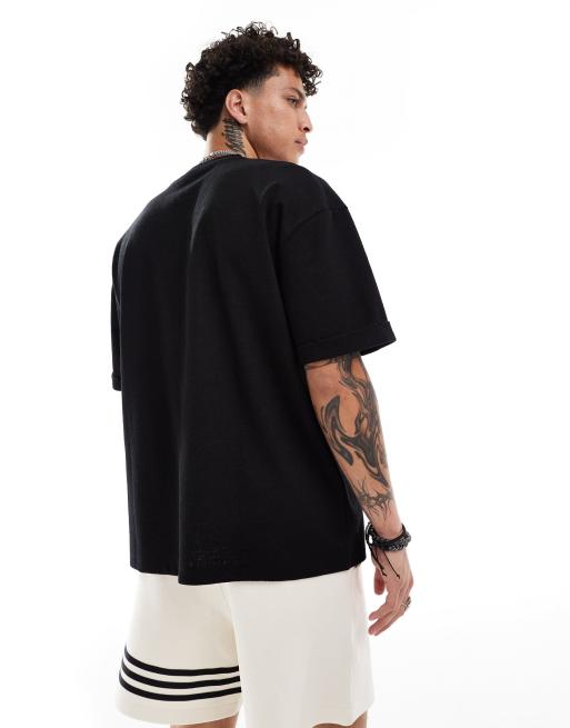 ASOS DESIGN – Svart crosshatch-strukturerad t-shirt i oversize med uppvikt ärm, 4 av 4