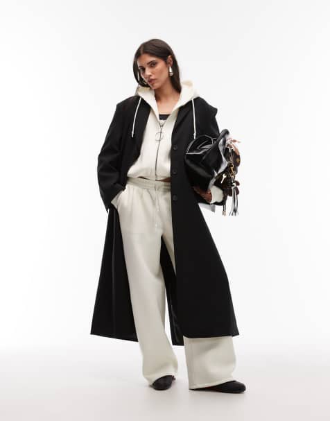 ASOS DESIGN – Svart, figursydd kavaj med axelvaddar i maxilängd och herrstil - view 1