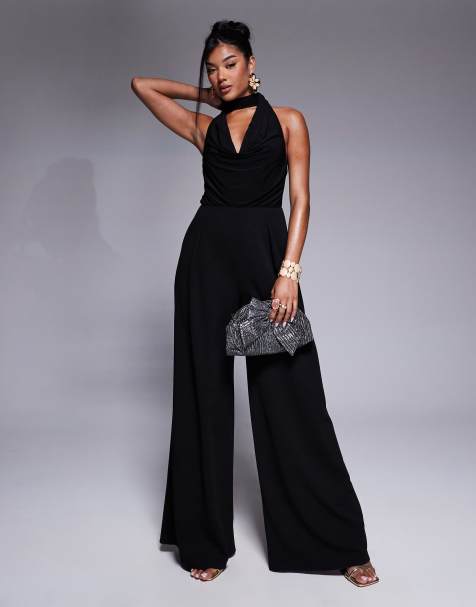 ASOS DESIGN – Svart jumpsuit i blandat material med vida ben, djup ringning och knytning vid halsen - view 1