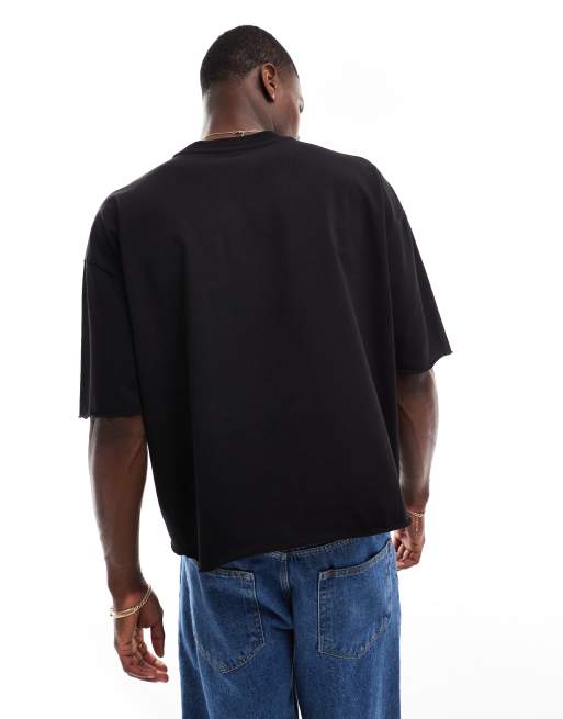 ASOS DESIGN – Svart kraftig t-shirt med avslappnad passform och råskuren fåll, 2 av 4