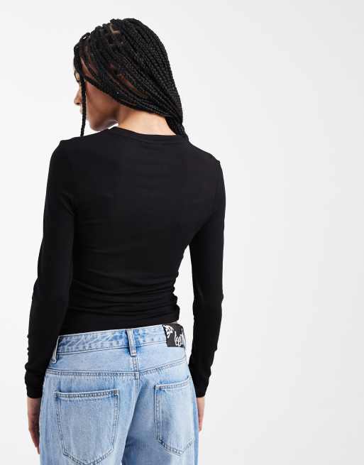 ASOS DESIGN – Svart långärmad topp med snurrad knut och asymmetrisk fåll, 4 av 4