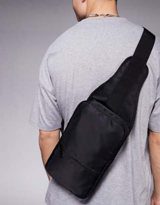 ASOS DESIGN – Svart, liten ryggsäck i nylon med en axelrem - view 1