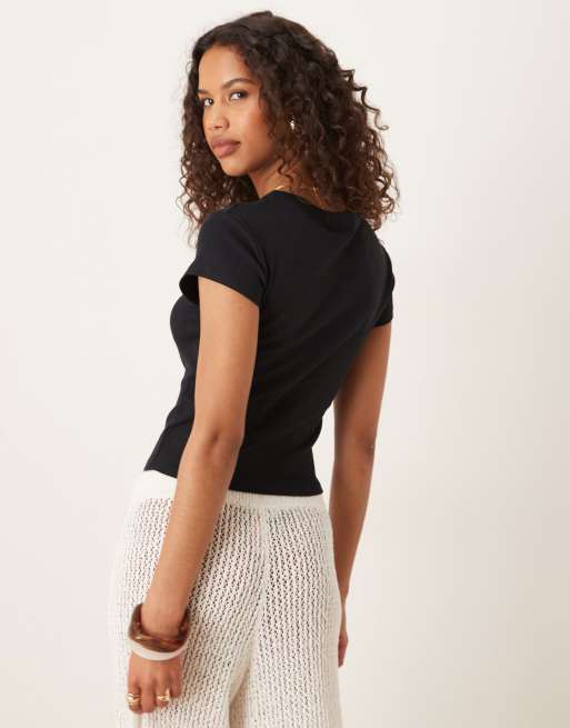 ASOS DESIGN – Svart, liten t-shirt med apelsintryck, 2 av 4