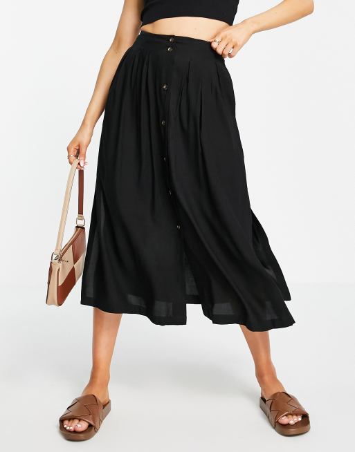 ASOS DESIGN – Svart midikjol med djupa fickor och knäppning