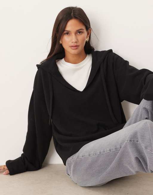 ASOS DESIGN – Svart, mjuk huvtröja med uppvikta ärmslut