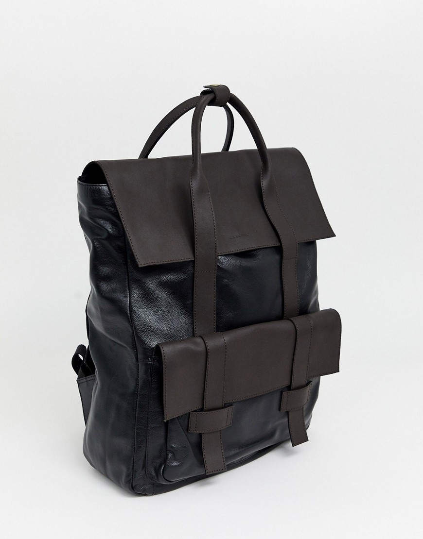 ASOS DESIGN – Svart och brun ryggsäck i läder med dubbla remmar