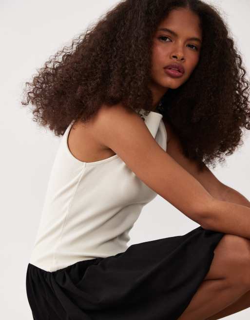 ASOS DESIGN – Svart och krämvit, ribbad, ärmlös miniklänning med ballongfåll, 3 av 4