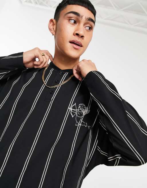 ASOS DESIGN – Svart- och vitrandig långärmad t-shirt i oversize med ribbad ringning