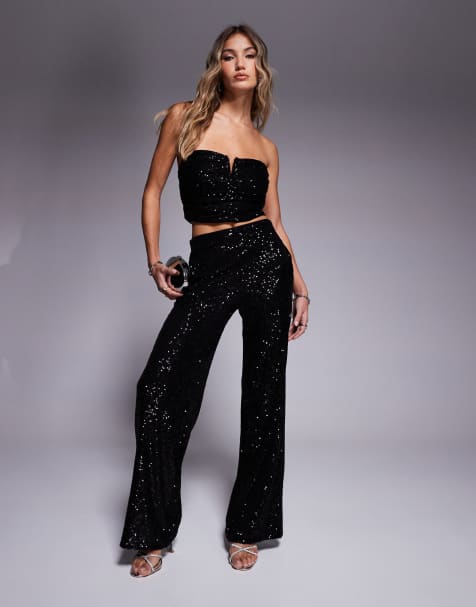 ASOS DESIGN – Svart, paljettprytt set med ryschad bandeau-topp och vida byxor - view 1