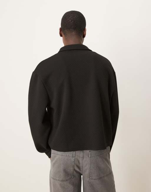 ASOS DESIGN – Svart pikétröja i oversize med sänkt axelsöm, boxig passform och blixtlåsficka, 3 av 4