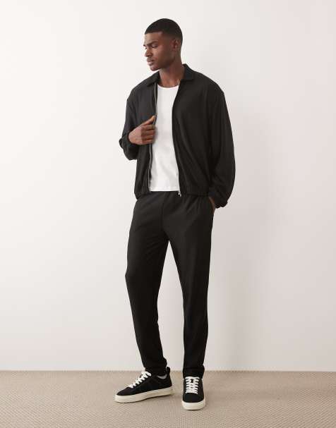 ASOS DESIGN – Svart, ribbat set med harrington-jacka i oversize med dragkedja och smala mjukisbyxor - view 1