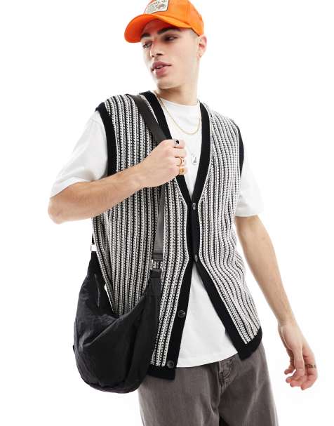 ASOS DESIGN – Svart ribbstickad kofta i oversize utan ärmar - view 1