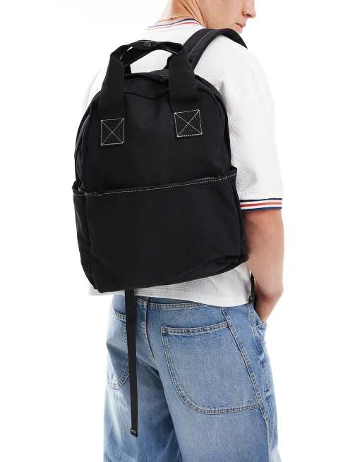 ASOS DESIGN – Svart ryggsäck med handtag och kontrastfärgad söm