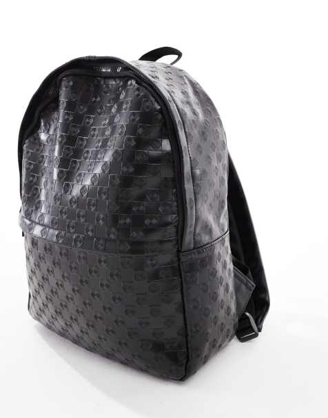 ASOS DESIGN – Svart ryggsäck med präglat mönster - view 1