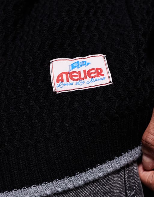 ASOS DESIGN – Svart strukturstickad tröja i oversize med vävd logga, 5 av 5