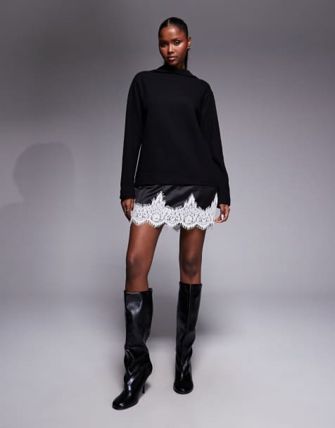 ASOS DESIGN – Svart, supermjuk miniklänning med ståkrage och kontrastfärgad spetsfåll - view 1