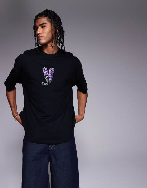 ASOS DESIGN – Svart t-shirt i oversize med blommig tryck framtill - view 1