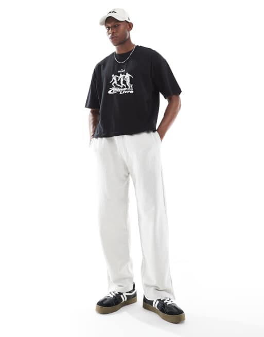ASOS DESIGN – Svart t-shirt i oversize med boxig passform och löpartryck, 3 av 4