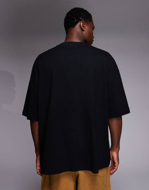 ASOS DESIGN – Svart t-shirt i oversize och stadsbroderi på bröstet, 3 av 5