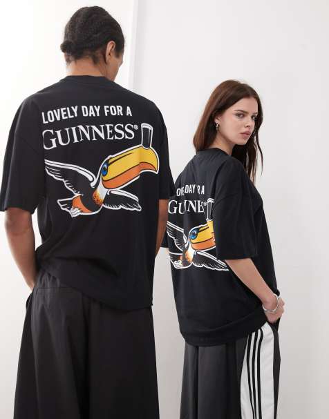 ASOS DESIGN – Svart t-shirt i unisex-modell och oversize med licenserat Guiness-tryck - view 1
