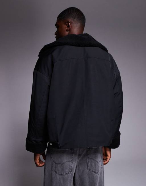 ASOS DESIGN – Svart, vadderad jacka i oversize med teddyfoder, 3 av 5