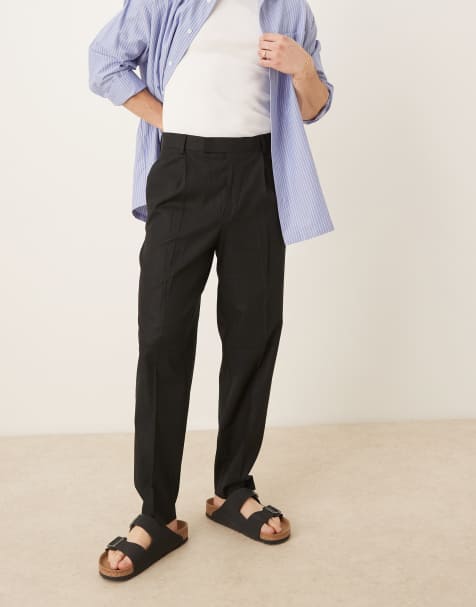 ASOS DESIGN – Svarta, avslappnade, avsmalnande finbyxor i med veck framtill i linnemix - view 1