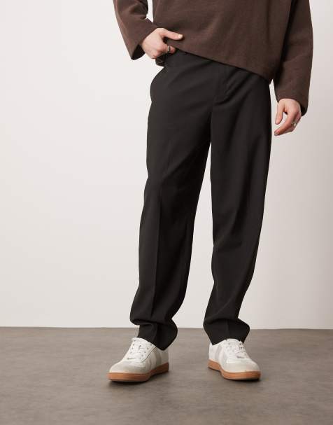 ASOS DESIGN – Svarta, avslappnade, avsmalnande finbyxor - view 1
