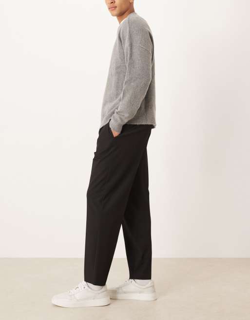 ASOS DESIGN – Svarta, avslappnade finbyxor med avsmalnande passform och veck, 3 av 5