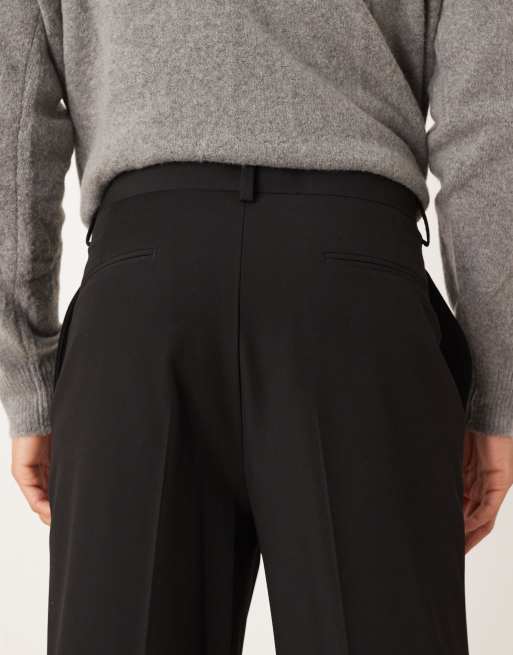 ASOS DESIGN – Svarta, avslappnade finbyxor med avsmalnande passform och veck, 5 av 5