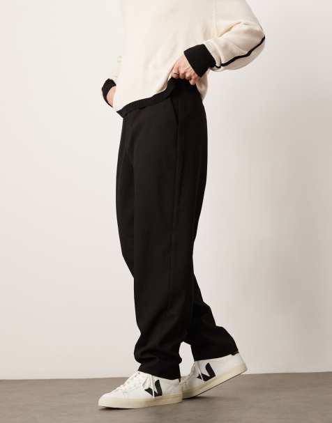 ASOS DESIGN – Svarta, avsmalnande byxor i oversize med struktur - view 1