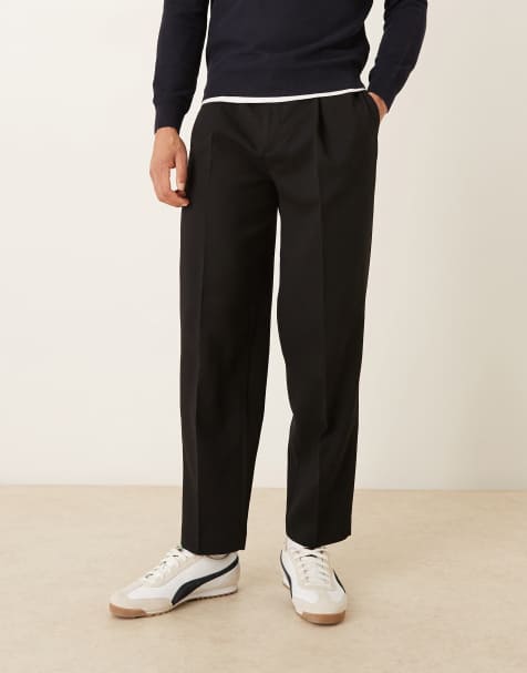 ASOS DESIGN – Svarta, avsmalnande finbyxor i oversized fit med veck och mikrotextur - view 1