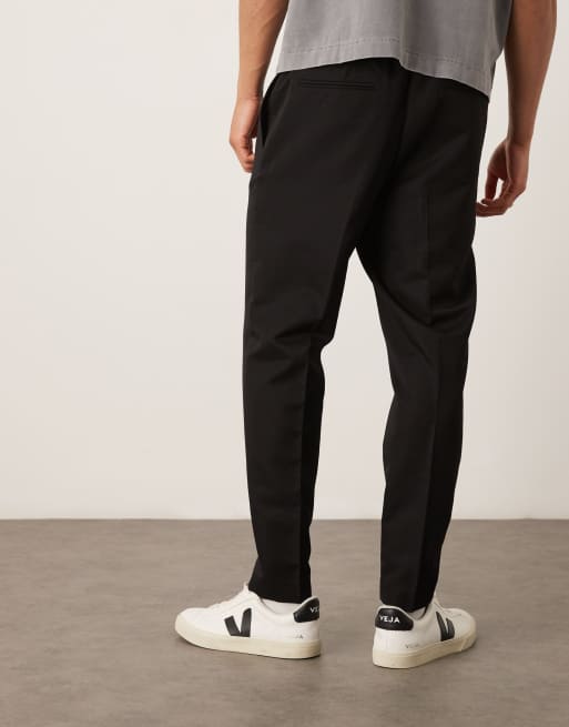 ASOS DESIGN – Svarta, avsmalnande finbyxor med resårmidja, 2 av 5