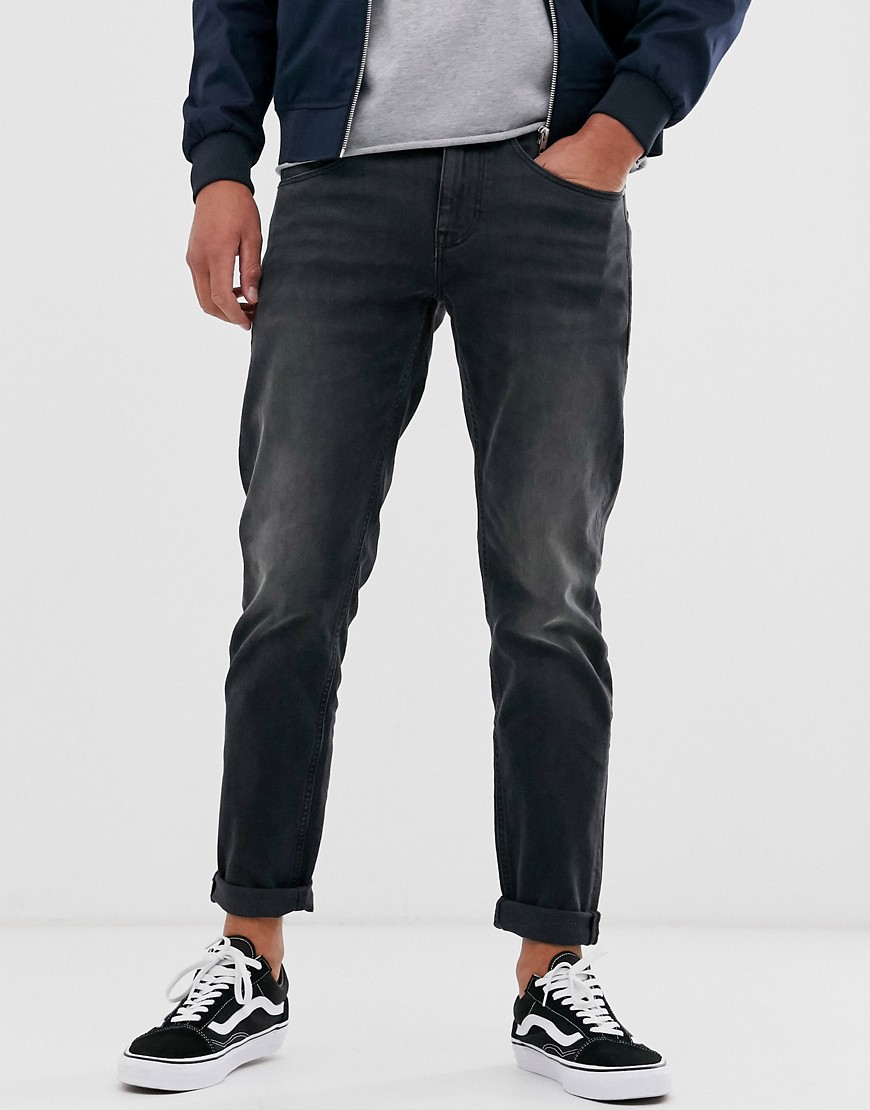 ASOS DESIGN – Svarta avsmalnande jeans med stretch