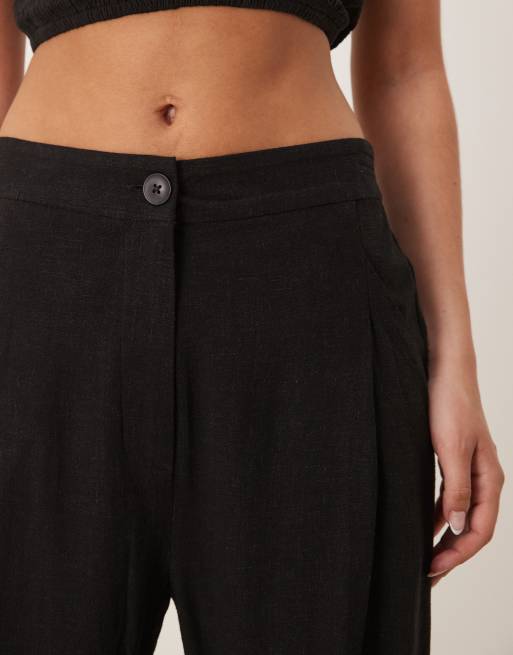 ASOS DESIGN – Svarta, avsmalnande linnebyxor med veck framtill, 4 av 5