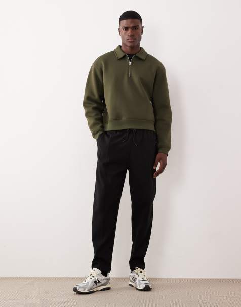 ASOS DESIGN – Svarta, avsmalnande mjukisbyxor med sydda pressveck - view 1