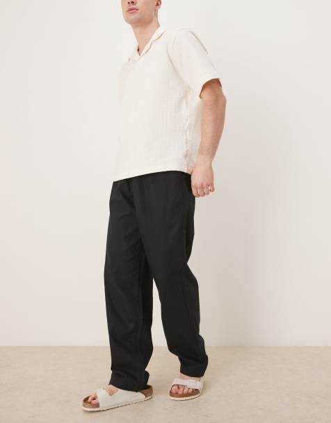 ASOS DESIGN – Svarta, baggy byxor i linnemix - view 1
