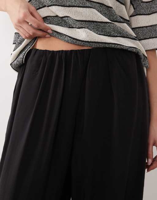 ASOS DESIGN – Svarta ballongbyxor i modalliknande tyg, 4 av 5