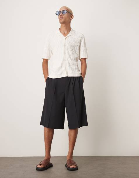 ASOS DESIGN – Svarta bermudashorts i oversize med veck framtill - view 1