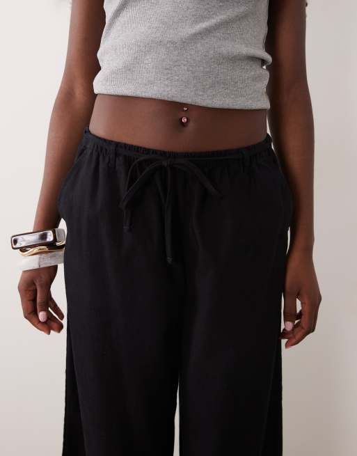 ASOS DESIGN – Svarta byxor i linnestil och dra på-modell, 3 av 5